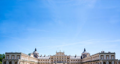 View of historical building against blue sky