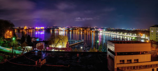 Panoramic view of ternopil pond and castle in ternopol, ukraine, on a winter night