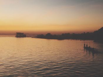 Scenic view of sea at sunset