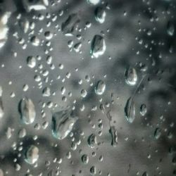 Close-up of water drops on glass