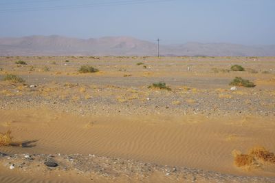 Scenic view of desert against sky