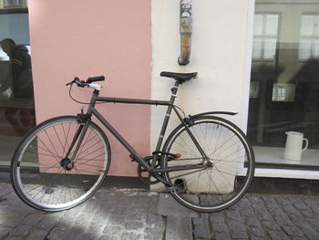 Bicycle against building