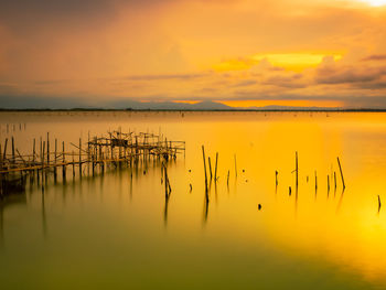 Scenic view of sea against sky during sunset