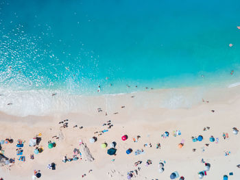 Low angle view of people at beach