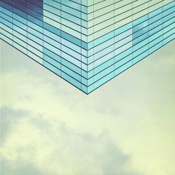 Low angle view of skyscraper against sky