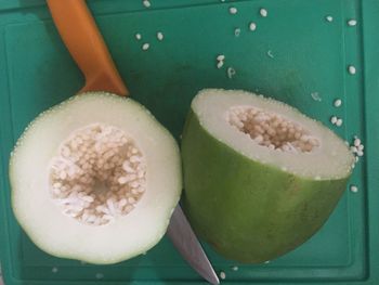 Close-up of fruit slices in bowl on table