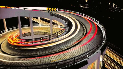 Light trails on staircase at night