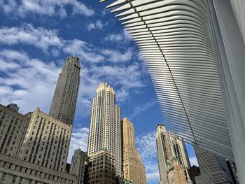 Low angle view of skyscrapers against sky