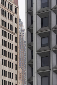 Low angle view of modern buildings in city