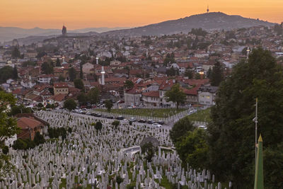 High angle view of kovaci war memorial and cemetery in sarajevo against sky during sunset