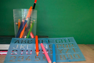 Close-up of school supplies on table