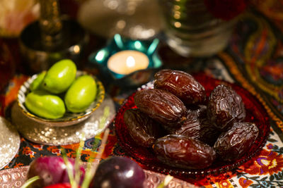 High angle view of fruits in plate on table