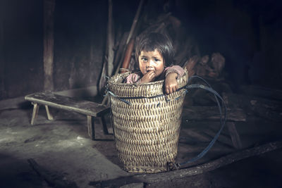 Portrait of girl in basket