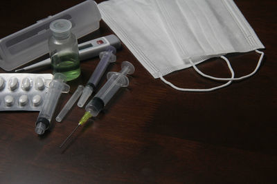 High angle view of bottles on table