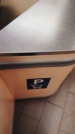 Low angle view of text on wall