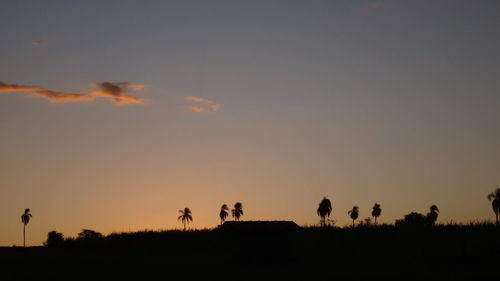 Scenic view of silhouette landscape against sky during sunset