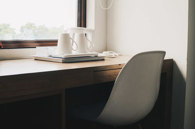 Empty chairs and table at home