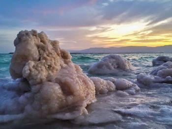 Scenic view of sea at sunset