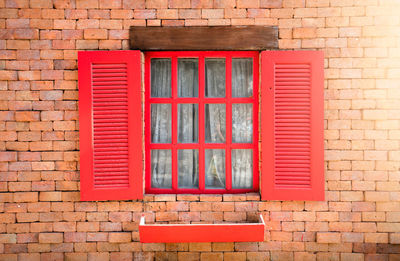 View of window on brick wall