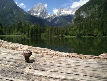 Close-up of pier over lake