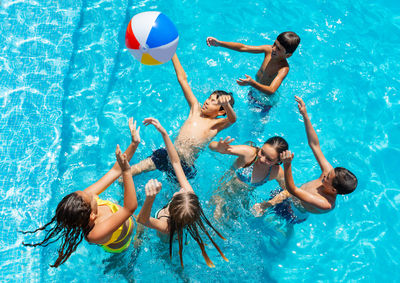 High angle view of man swimming in pool