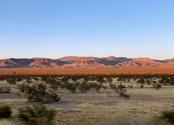 Scenic view of landscape against clear sky