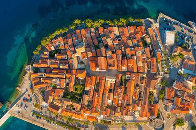 High angle view of illuminated buildings in city