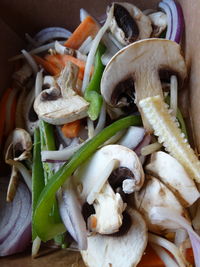 High angle view of mushrooms in container