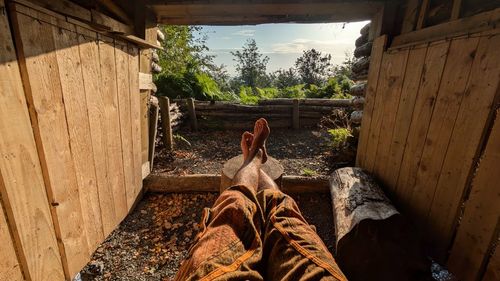 Low section of man walking on footpath
