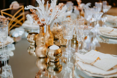 Glass of drinking glasses on table at restaurant