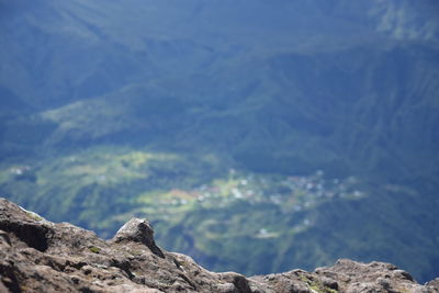 Scenic view of rocks in mountains against sky