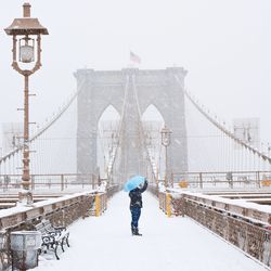 Tourist in front of snow