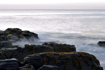 Scenic view of sea against clear sky