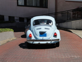 Toy car on street in city