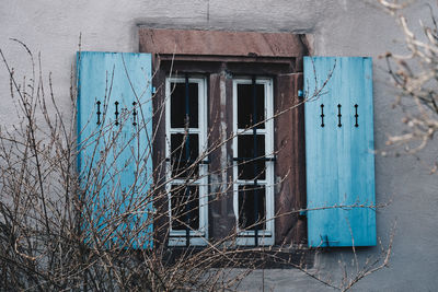 Blue window of old building