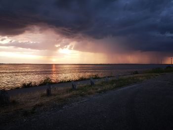 Scenic view of sea against sky during sunset
