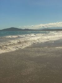 Scenic view of sea against clear blue sky