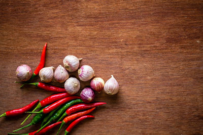 Directly above shot of chili peppers on table