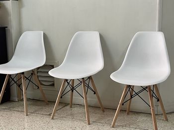 Three white chairs