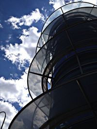 Low angle view of building against cloudy sky