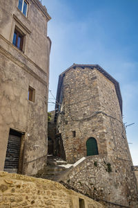 Low angle view of old building against sky