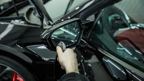 Close-up of man driving car