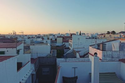 High angle view of townscape against sky during sunset