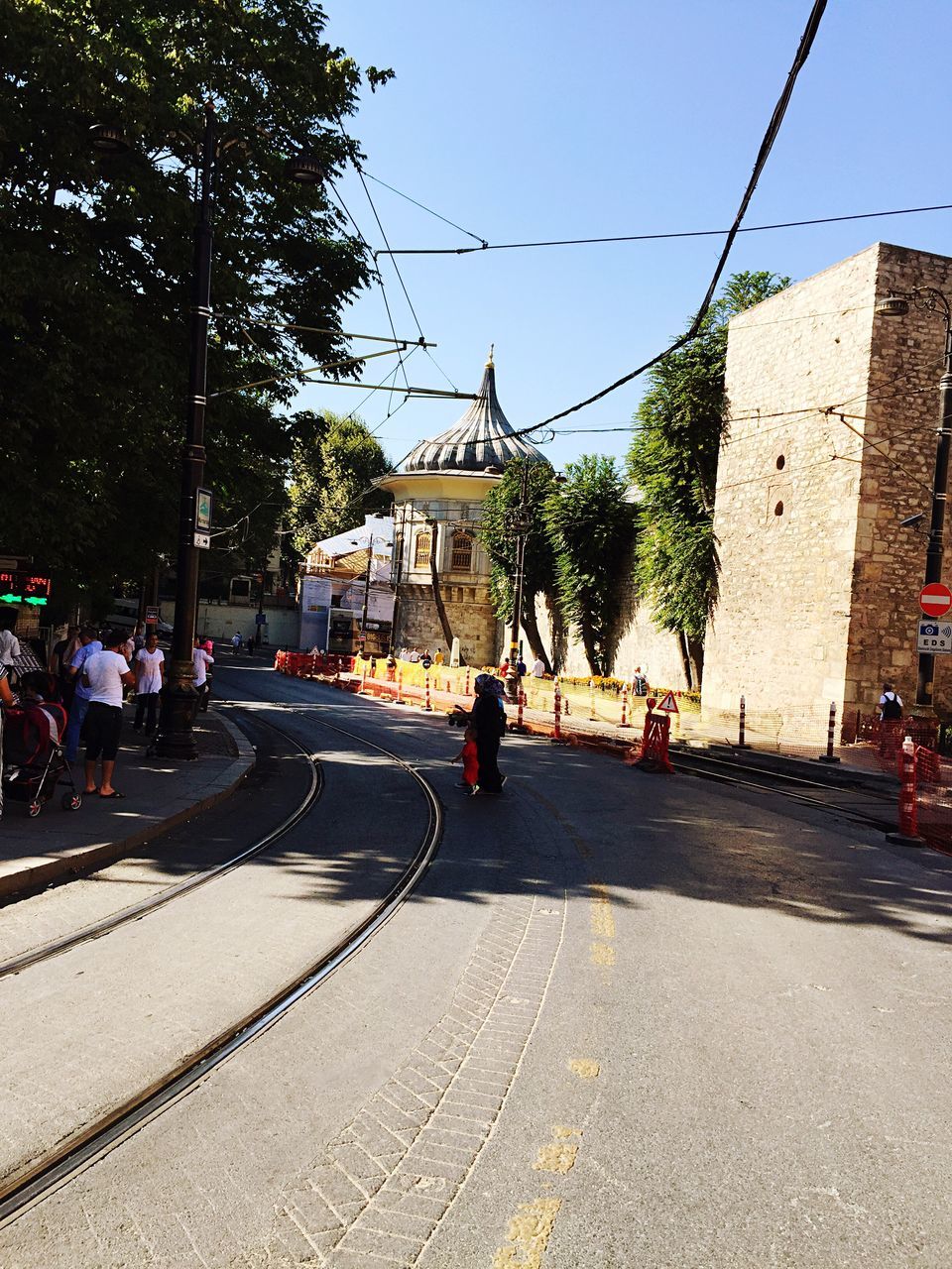 VIEW OF CITY STREET AGAINST SKY