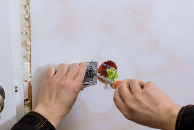 Cropped hand of woman holding ice cream