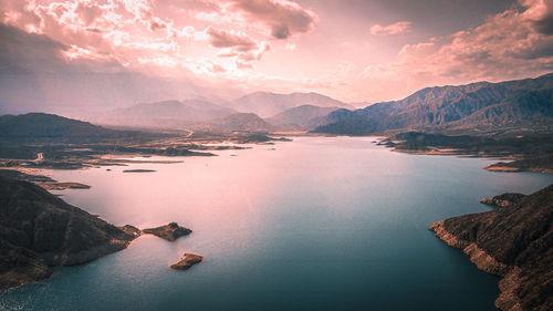 Aerial view of lake against sky during sunset