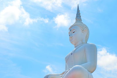 Low angle view of statue against sky