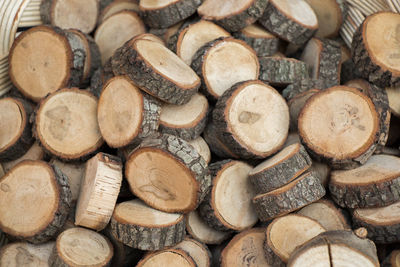 Full frame shot of logs in forest