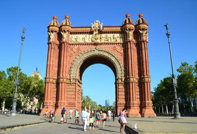 Group of people in front of historical building