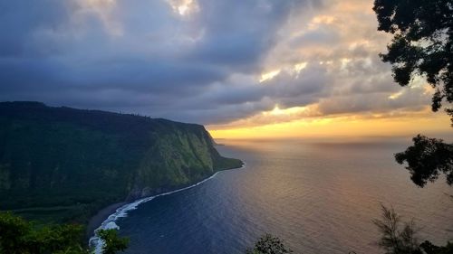 Scenic view of sea against sky during sunset